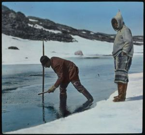 Image of Ralph Robinson Spearing Trout, Baffin Land